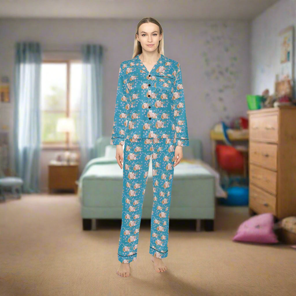 Woman wearing a blue pajama set with a floral pattern on a white background