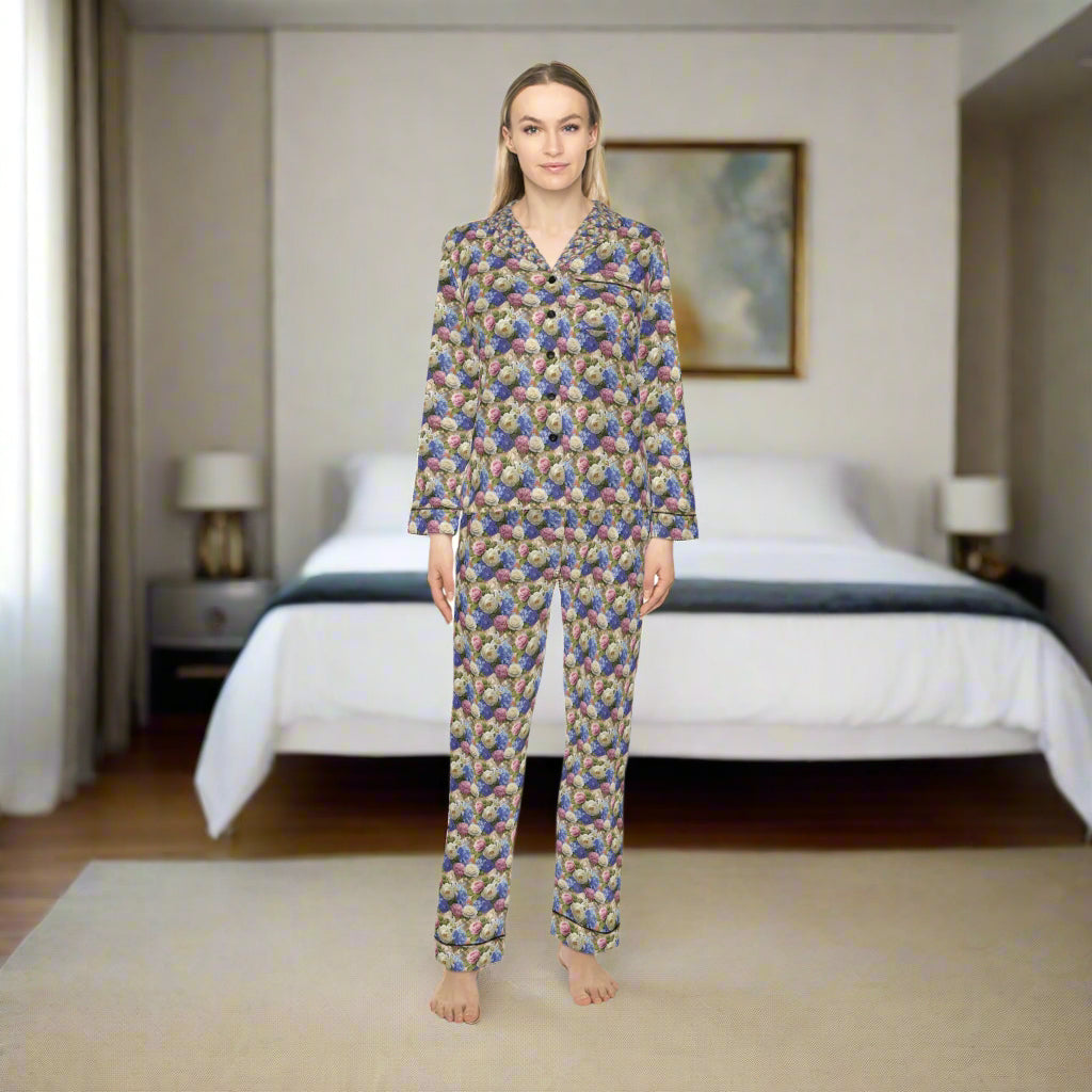 Woman wearing a patterned pajama set on a white background