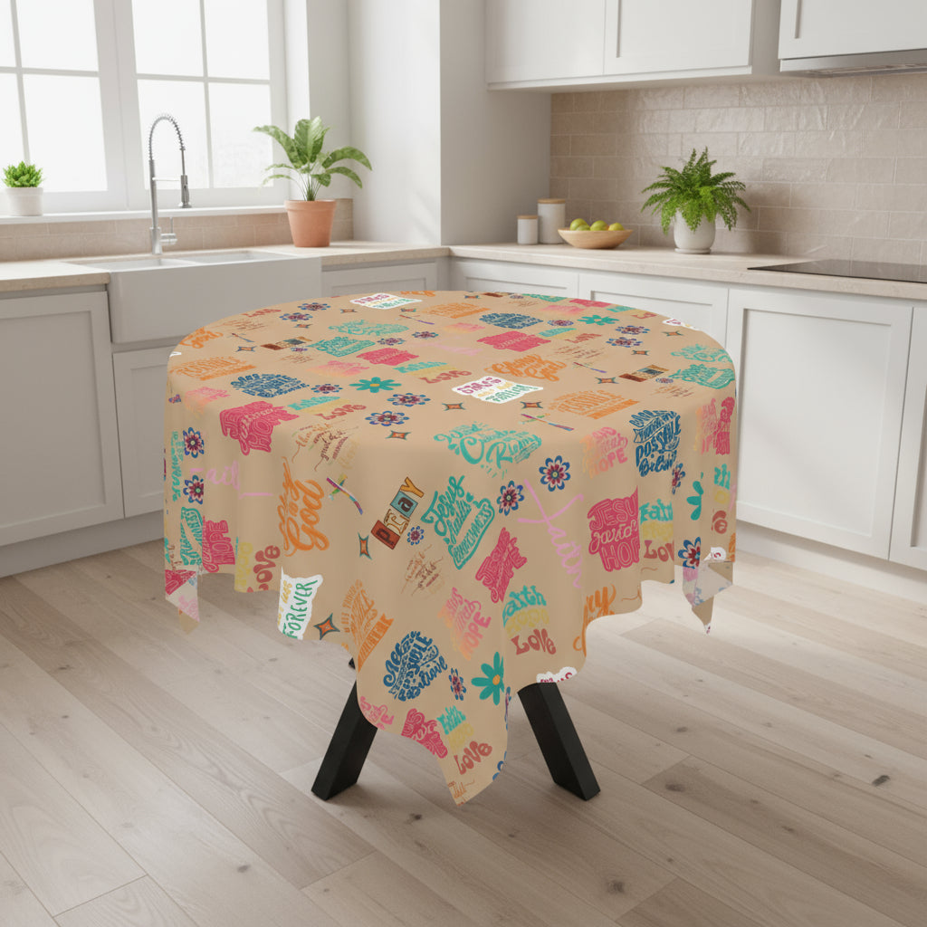 Round table with a colorful patterned tablecloth on a white background