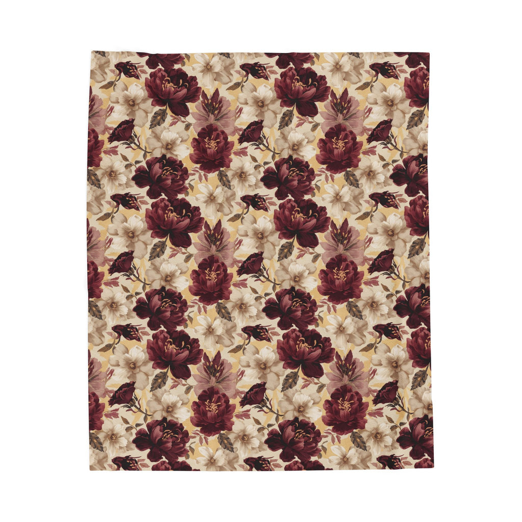 A rectangular fabric item, likely a blanket or towel, featuring a dense vintage floral pattern with burgundy peonies, cream lilies, and muted green leaves on a warm beige background.