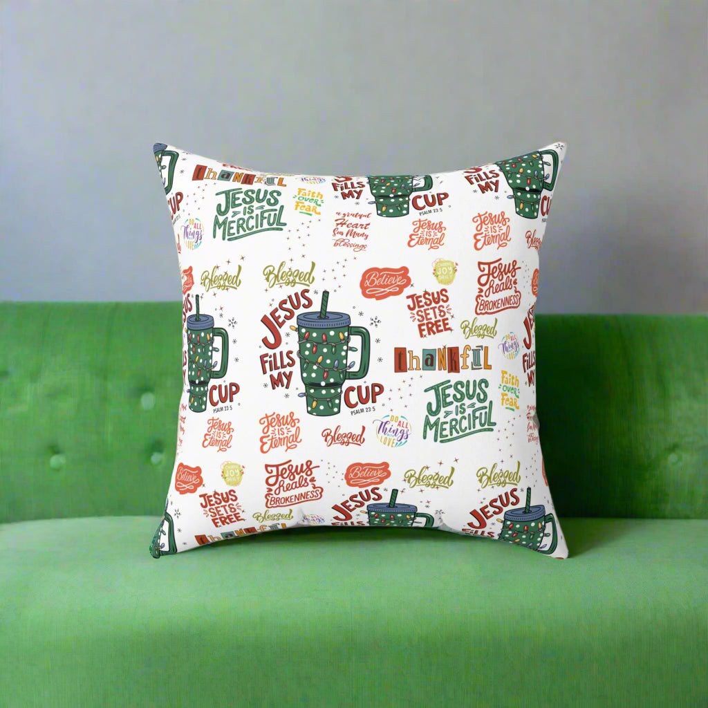 Decorative pillow with religious text and graphics on a white background