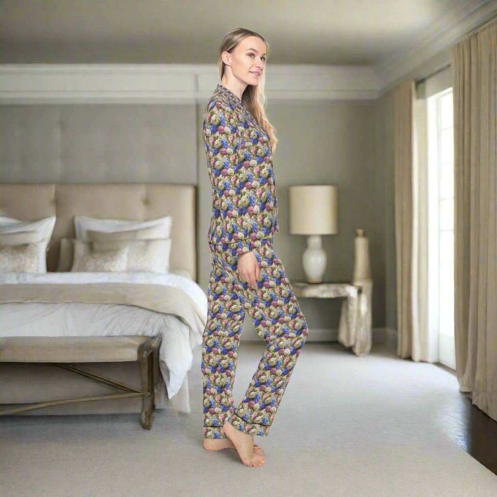 Woman wearing a patterned pajama set on a white background