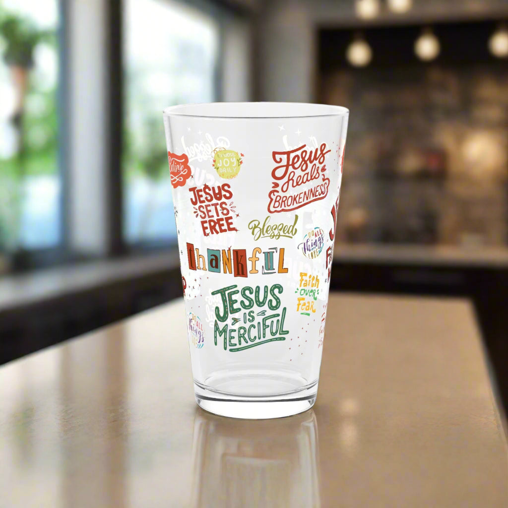 Clear glass with motivational phrases on a white background