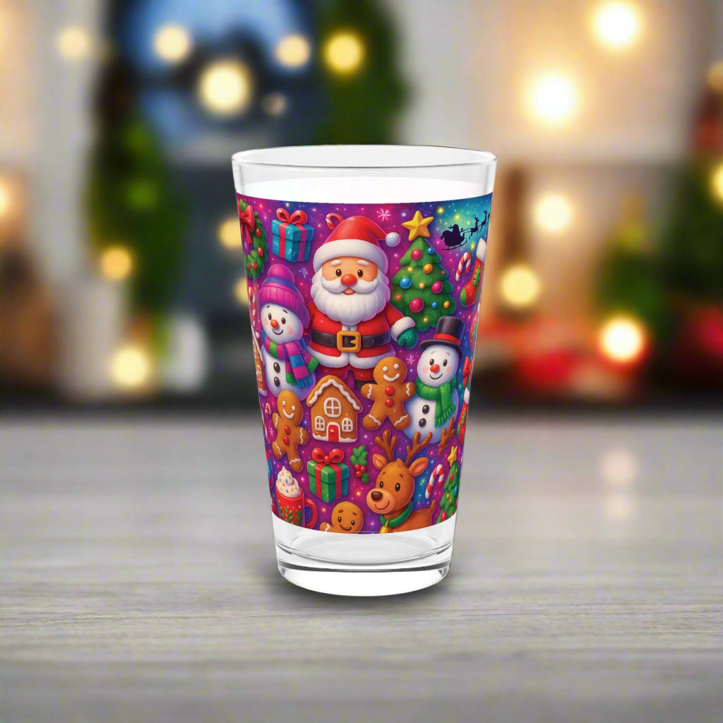 Colorful glass with Christmas-themed design featuring Santa Claus, snowmen, and presents on a white background.