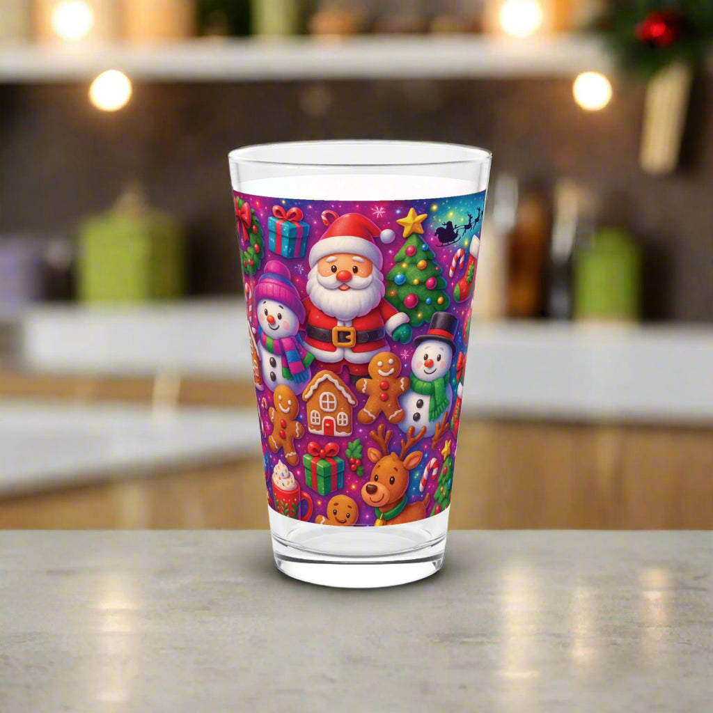 Colorful glass with Christmas-themed design featuring Santa Claus, snowmen, and presents on a white background.