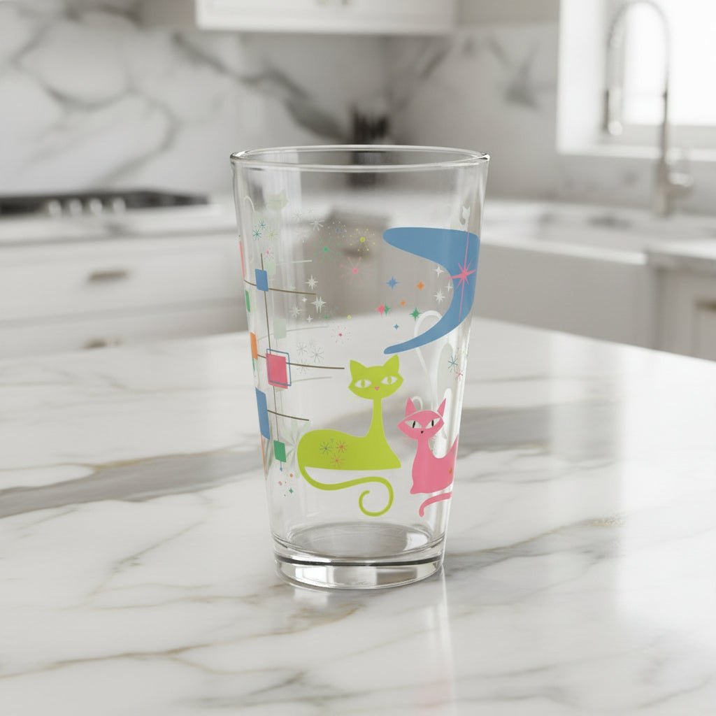 Clear glass with colorful cat design on a white background