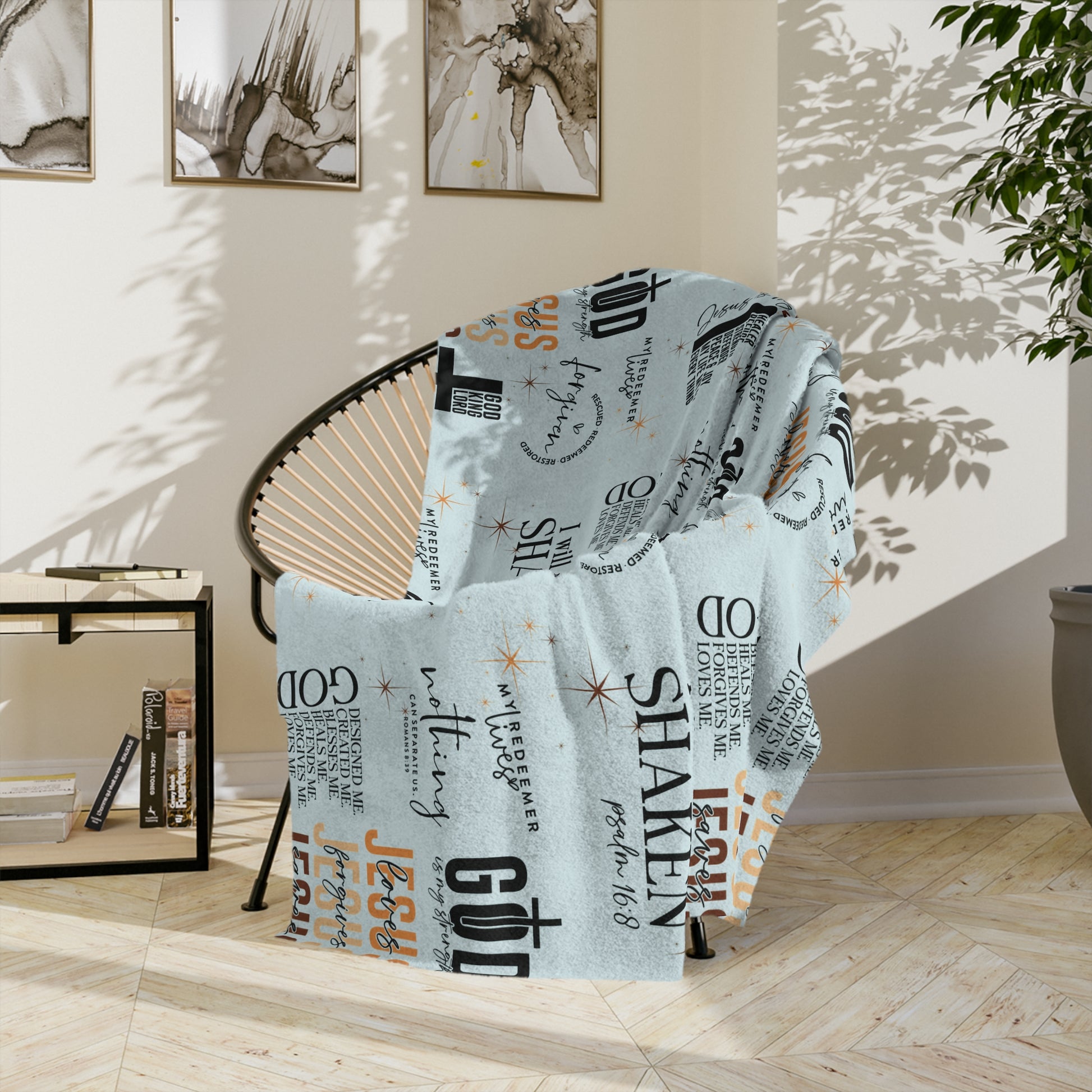 Textured blanket draped over a chair in a room with light-colored walls and decor.