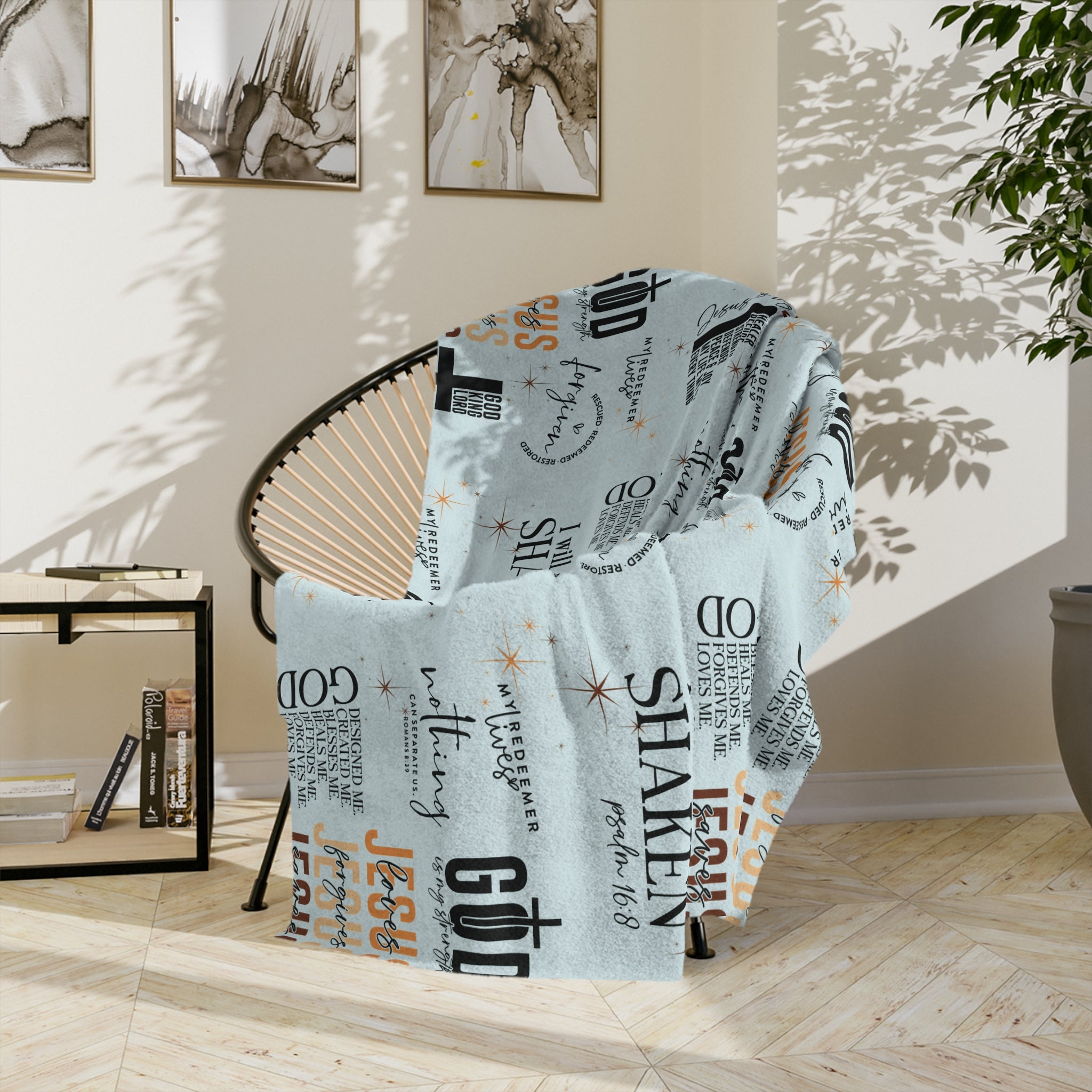 Textured blanket draped over a chair in a room with light-colored walls and decor.