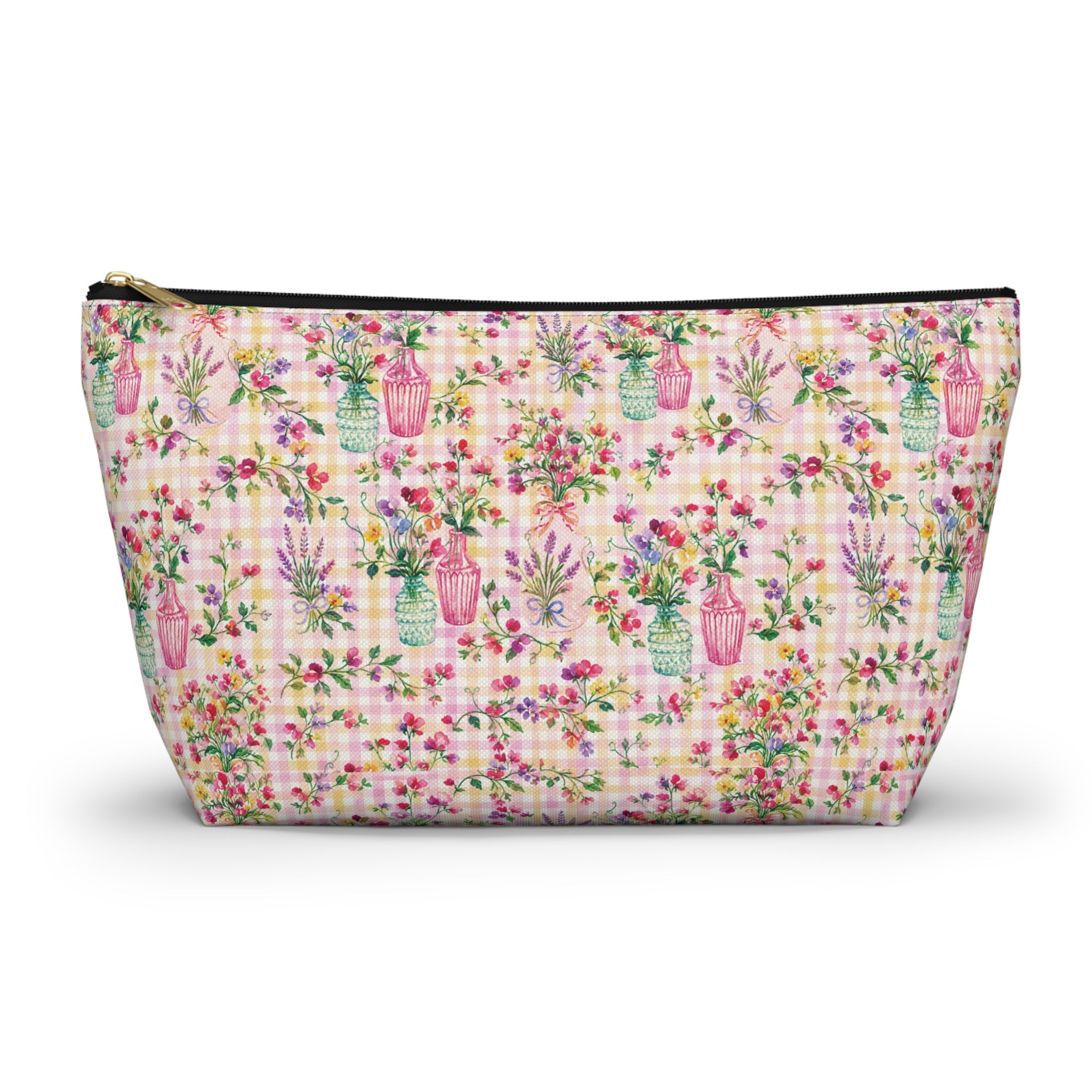 Floral patterned pouch with pink and green design on a white background