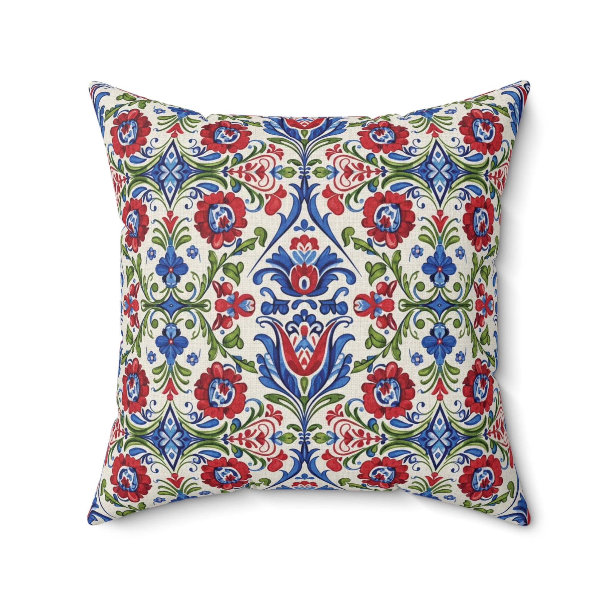 Decorative pillow with a colorful floral pattern on a white background