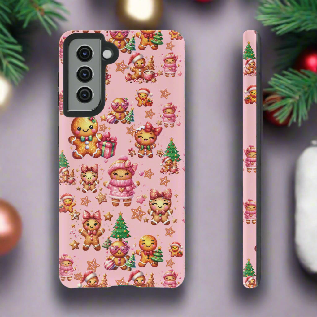 Phone case with Christmas-themed design on a pink background
