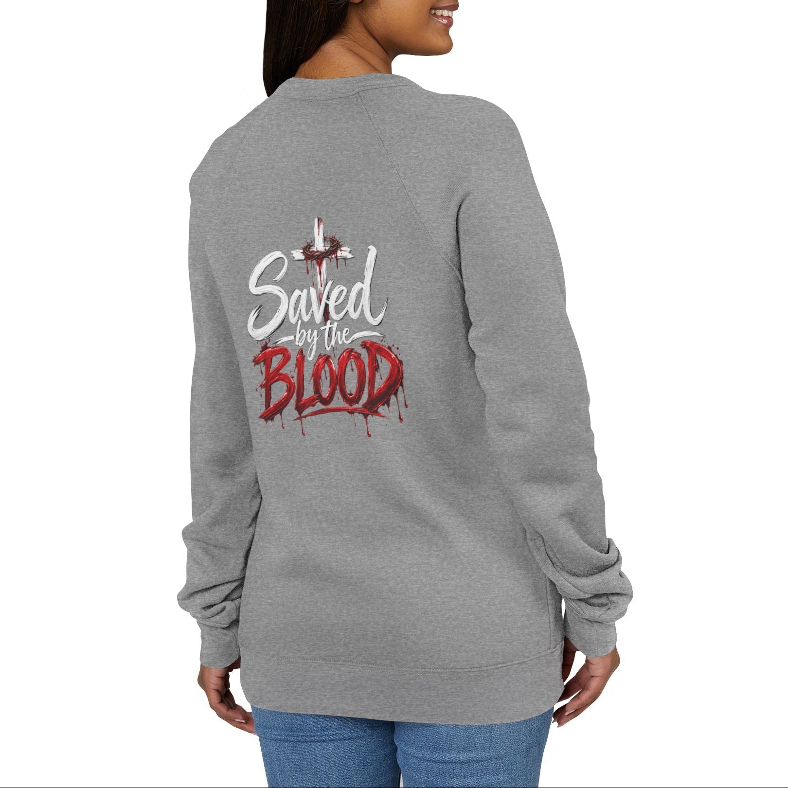 Woman wearing a gray sweater on a white background