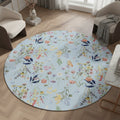 Round floral-patterned mat with colorful flowers on a light blue background