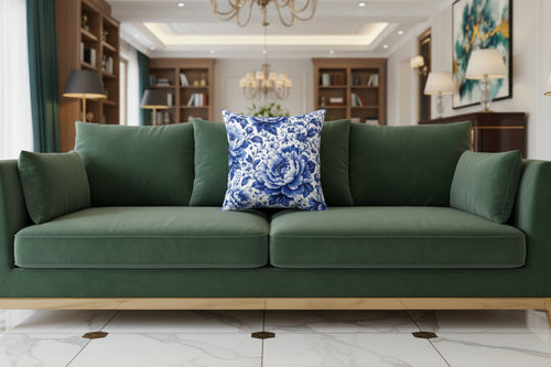 A square decorative throw pillow featuring a classic blue and white floral pattern, photographed against a clean white background.