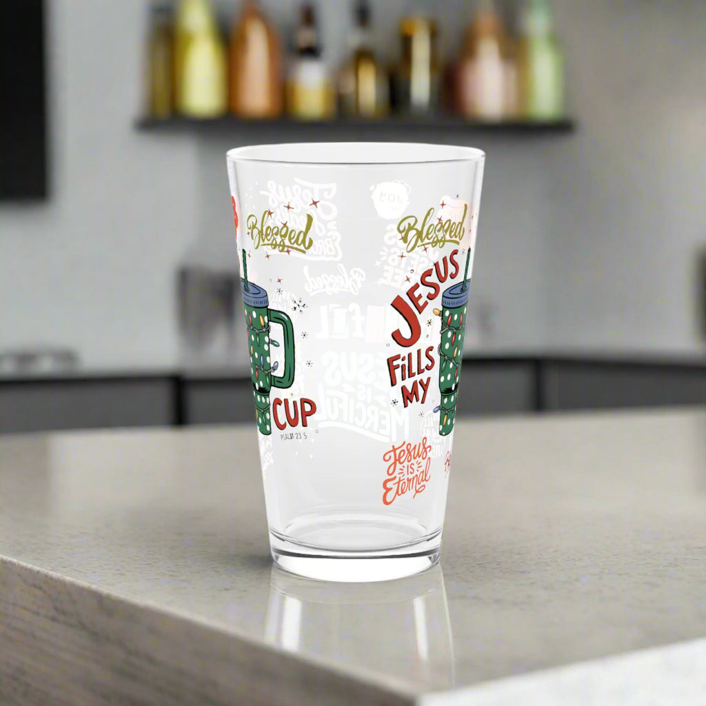 Clear glass with colorful text and designs on a white background