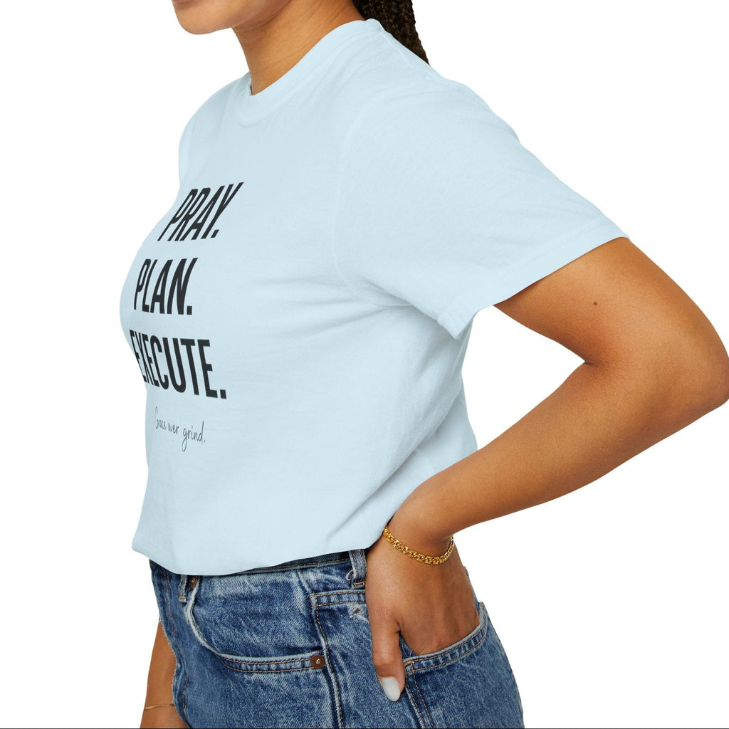 Woman wearing a light blue t-shirt with text on a white background