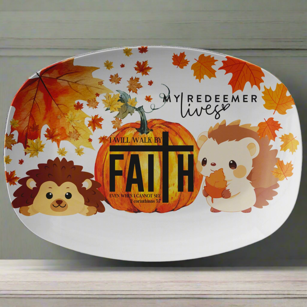Decorative plate with autumn design, animals, and religious text on a white background